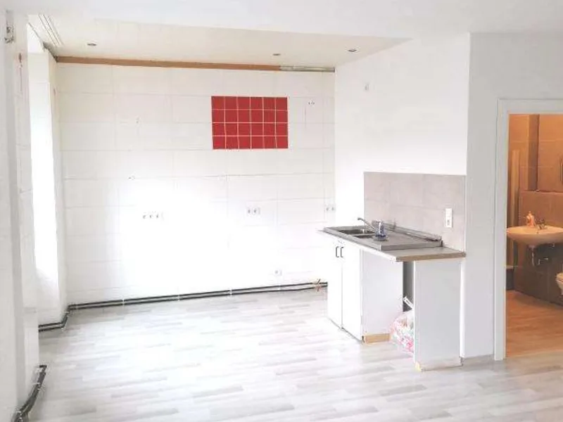 Zona de cocina del edificio plurifamiliar en Holzhausen