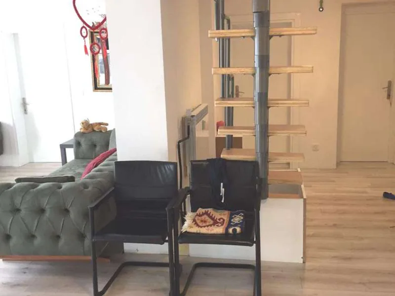 Zona de estar dúplex del edificio plurifamiliar en Holzhausen